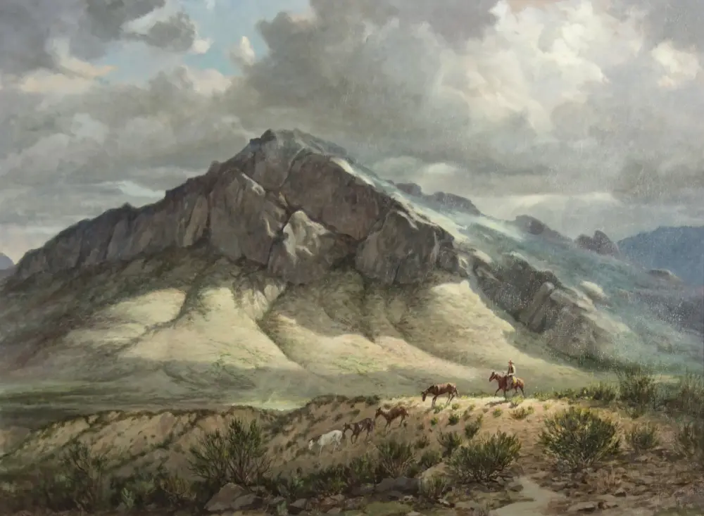 Rocky mountain peak under a cloudy sky with a few riders on horseback in the foreground.