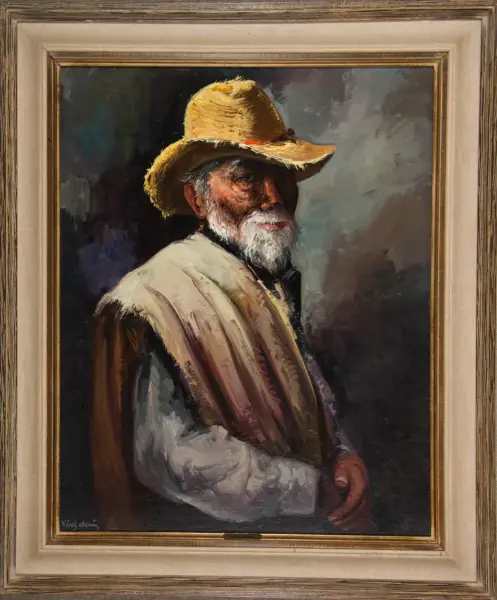 Portrait of an older man with a white beard wearing a wide straw hat and cream cloak, looking over his shoulder.