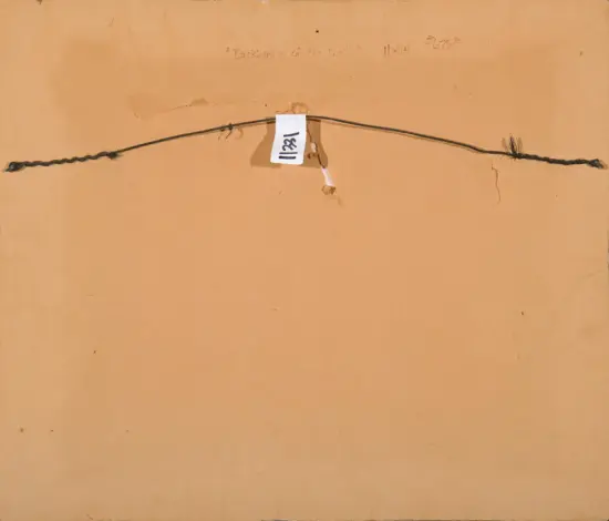 Back of a framed piece showing a hanging wire across the back, with a white tag bearing a handwritten number in the center.
