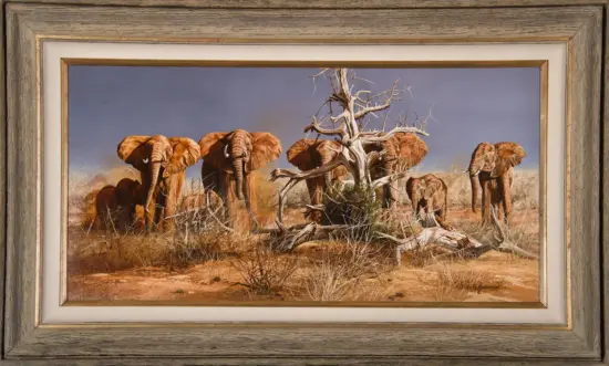 Framed painting showing a herd of elephants in a dry savanna with a twisted dead tree.