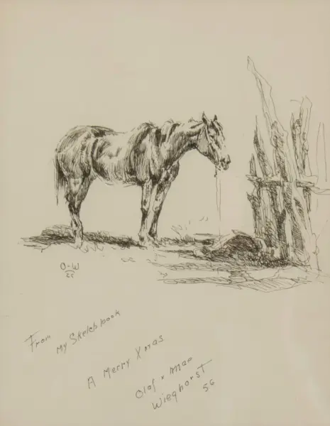 Pencil sketch of a horse standing near a wooden fence, with rough ground shading and handwritten notes on the page nearby (From my sketch book, A Merry Xmas).