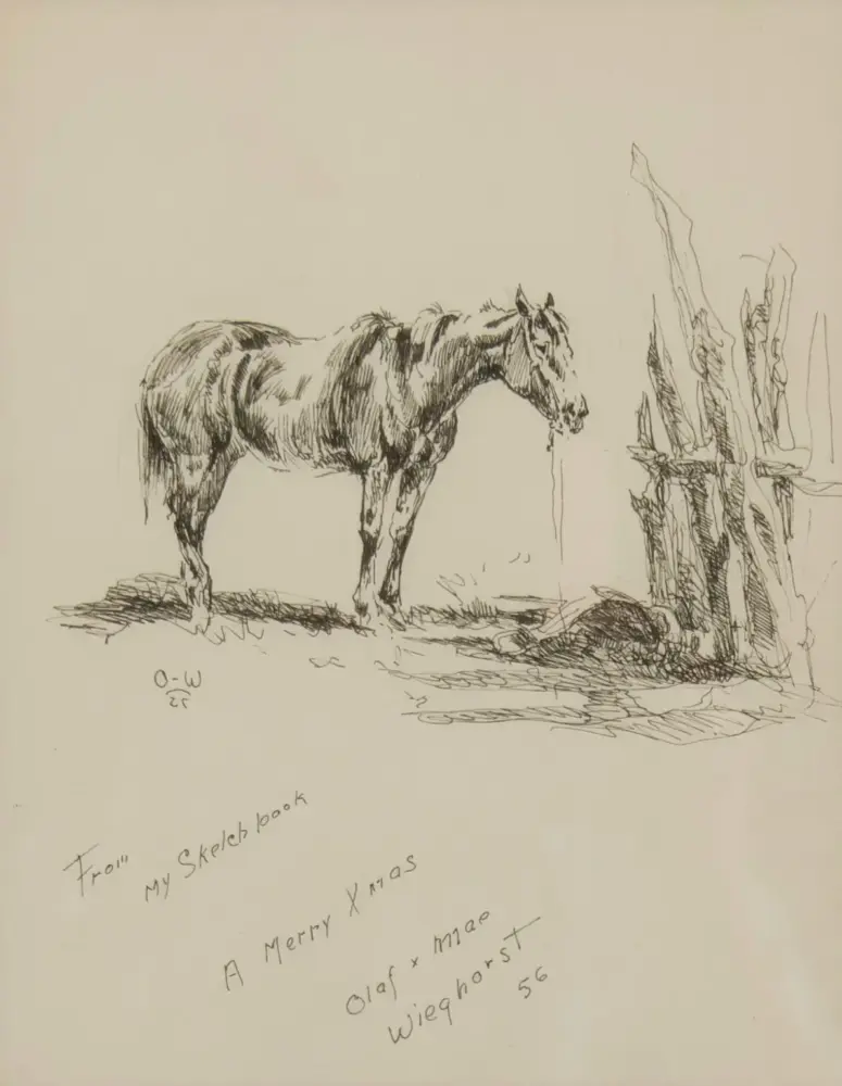 Pencil sketch of a horse standing near a wooden fence, with rough ground shading and handwritten notes on the page nearby (From my sketch book, A Merry Xmas).
