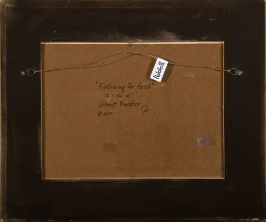 Back of a framed painting showing a hanging wire, label tag, and handwritten title: 'Following the Herd' by Grant Redden, 2015 (12 x 16 oil).