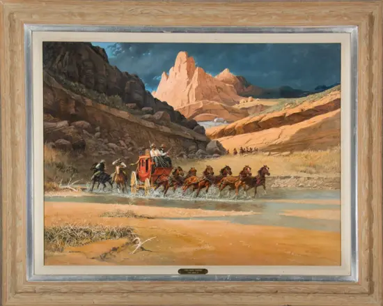 A red stagecoach driven by two men crosses a shallow river, eight horses pulling it, against a rugged canyon landscape with mountains in the background.