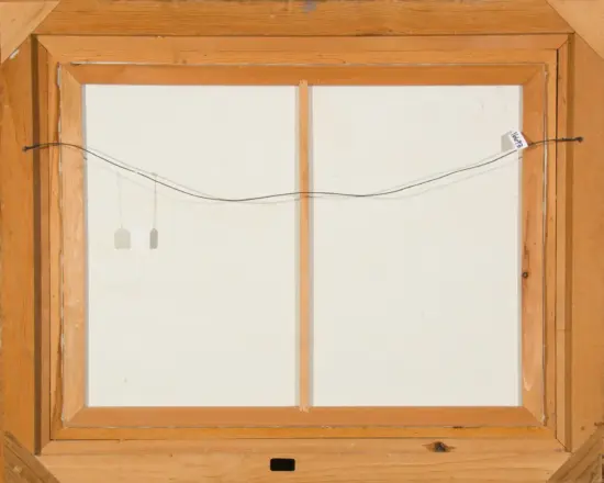 Wooden window frame with a wire stretched across the middle and two small tags hanging on the left side.