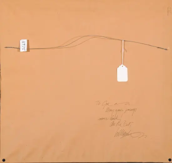 Back of a brown cardboard artwork with a hanging wire, a white tag, and a cursive dedication on the right side.