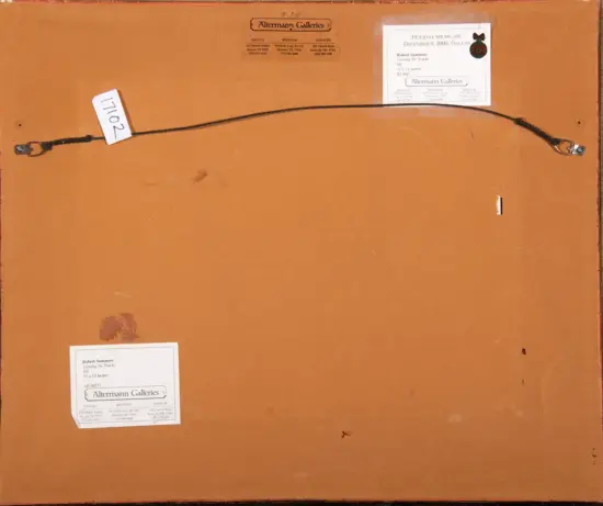 Back of a brown wooden artwork with gallery labels from Altermann Galleries and a hanging wire along the top edge