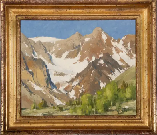 Framed landscape painting of snow-capped alpine mountains under a blue sky, with a green valley in the foreground.