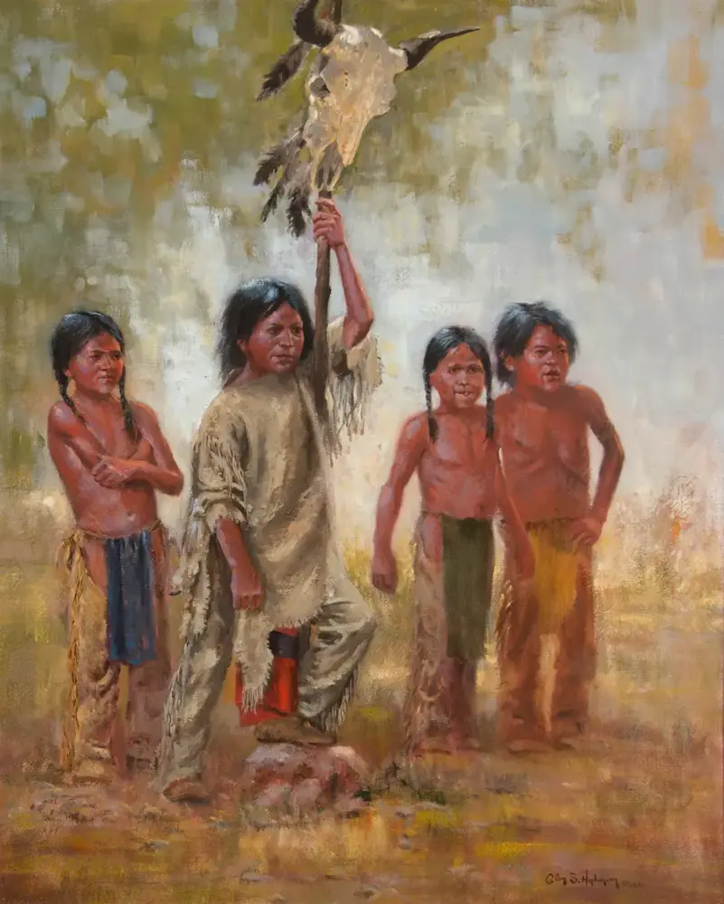 Indigenous man with four children outdoors, raising a staff topped with an eagle head.