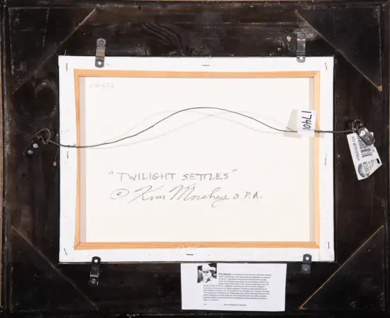 Back of a framed artwork showing a hanging wire, wall hooks, and a small label; the title 'TWILIGHT SETTINGS' is handwritten on the back with the artist's signature.