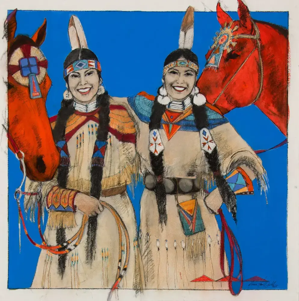 Two Indigenous women in ceremonial dress with braided hair and feather headdresses, standing beside two red horses against a blue background, smiling.