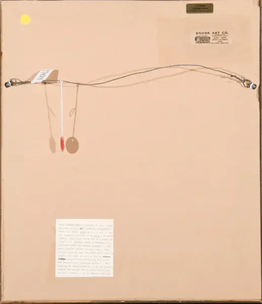 Back of a framed artwork: a thin hanging wire spans left to right with end anchors, small circular tags hanging from a white string, and several labels/stickers on the back.