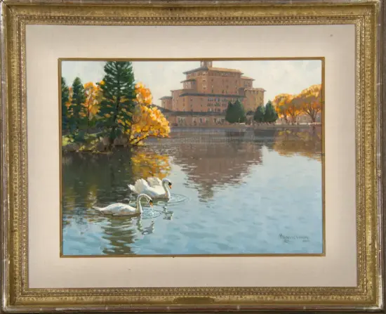 Autumn scene painting: a large brick building by a lake with orange trees, and two swans gliding on the water near the shore.