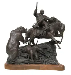Bronze sculpture of a mounted rider raising a pistol while charging forward, with figures struggling beneath and a wooden base.