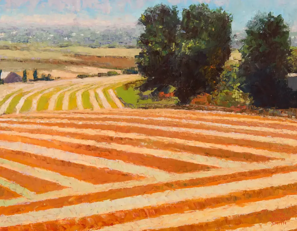 Impressionist landscape with orange fields in parallel rows and a cluster of trees on the right under a blue sky