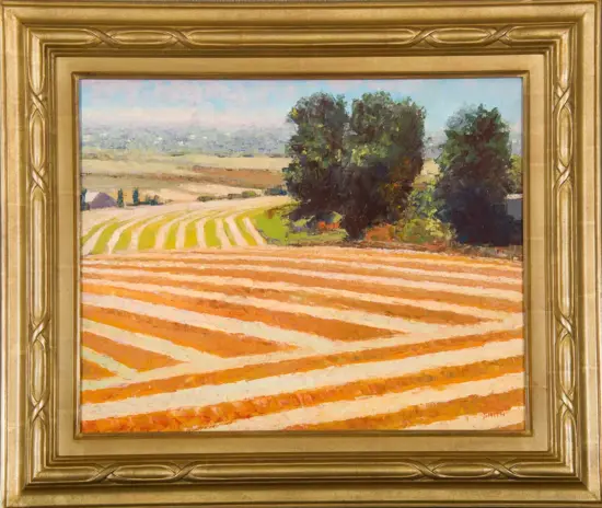 Landscape painting: striped orange and cream fields with two large trees, distant hills and blue sky, set in an ornate gold frame.