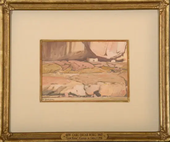 Framed pastel landscape of canyon cliffs with pink rocks and small white huts, titled 'Cliff Ruins' Canyon de Chelly (1916).
