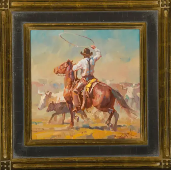 Impressionist painting of a cowboy on a brown horse, swinging a lasso amid a dusty desert scene, inside a gilded ornate frame.