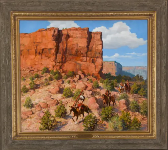 Framed landscape painting of a red canyon with riders on horseback under a blue sky and clouds.
