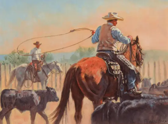 Two cowboys on horseback crossing rocky ground at sunset, one swinging a lasso while another watches nearby.