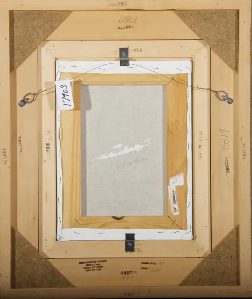 Back of a framed canvas on a wooden stretcher, showing a canvas, inner support frame, hanging wire, and inspection labels/numbers.