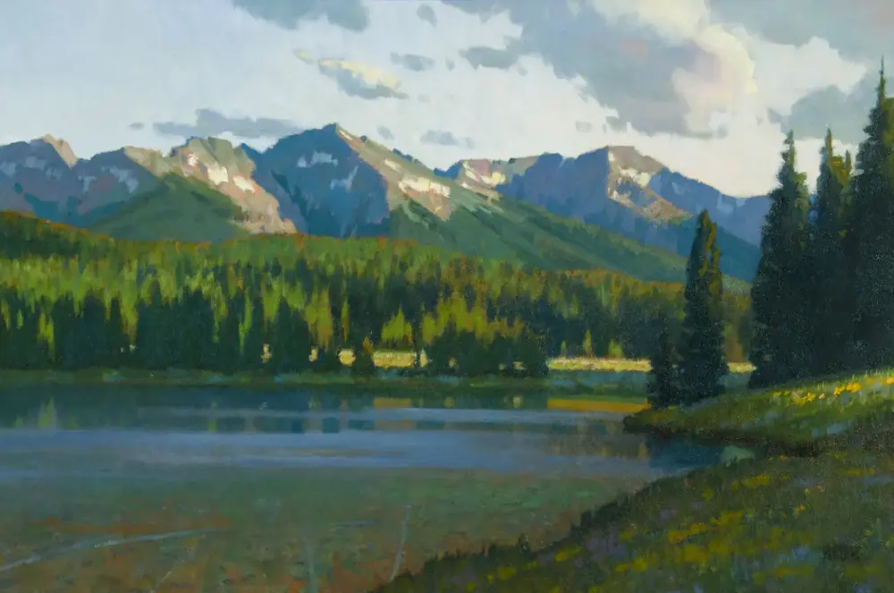 A tranquil landscape painting of a forested shoreline with a calm lake and snow-capped mountains in the distance under a cloudy sky.