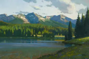 A tranquil landscape painting of a forested shoreline with a calm lake and snow-capped mountains in the distance under a cloudy sky.