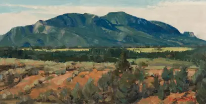 Impressionistic landscape of a broad mountain range with blue-green peaks and a grassy plain in the foreground under a pale sky.