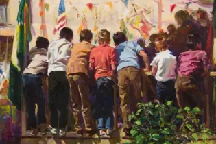 Group of children leaning over a railing at a colorful festival with flags overhead