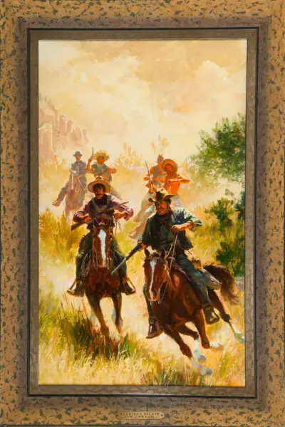 Framed western painting of cowboys on horseback chasing bandits through a dusty landscape; plaque reads 'Bandido's Escape' by Jim Carson.