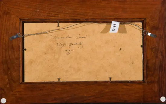 Back of a wooden framed artwork; handwritten title 'November Snow' by D.F. Gable, 1906, with hanging wire visible on the sides.