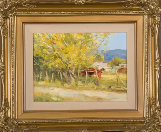 Oil painting of a rural landscape with yellow autumn trees, a dirt path, and small red buildings with distant blue mountains under a clear sky.