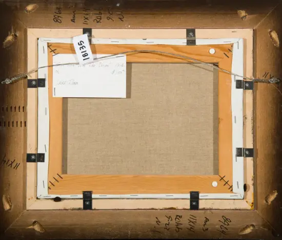 Back of a framed canvas showing wooden stretcher bars, a hanging wire, metal brackets, and handwritten notes around the edges