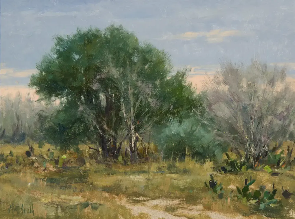 Impressionist landscape with a large green tree left of center, dry grasses in foreground, pale blue sky with soft clouds on a calm day.
