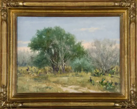 Framed landscape painting of a grassy field with a cluster of green trees under a pale blue sky.