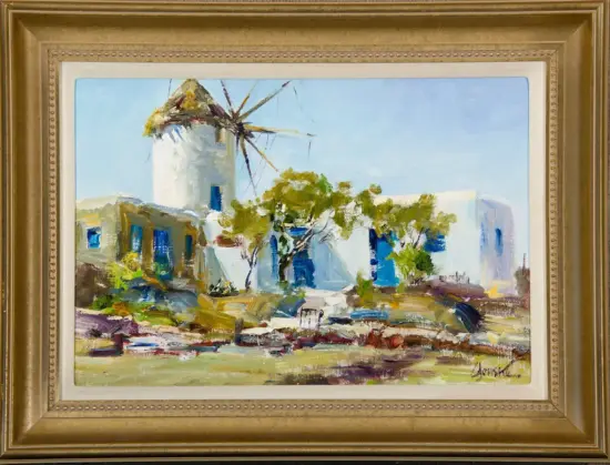 Impressionist painting of a white windmill with a thatched roof and dark blades, set among white buildings with blue doors and green trees under a blue sky, framed in a gold ornate frame.