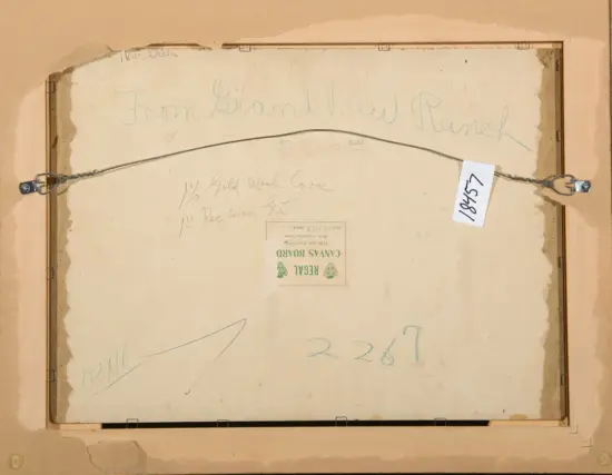 Back of framed canvas showing hanging wire, a white tag labeled 18457, and handwritten notes on the reverse side.