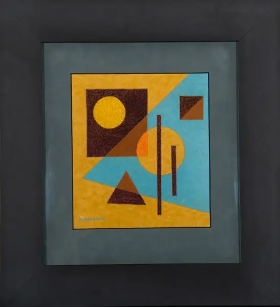 Abstract geometric painting with yellow, brown, and turquoise shapes, including circles, triangles, and vertical bars on a framed canvas.