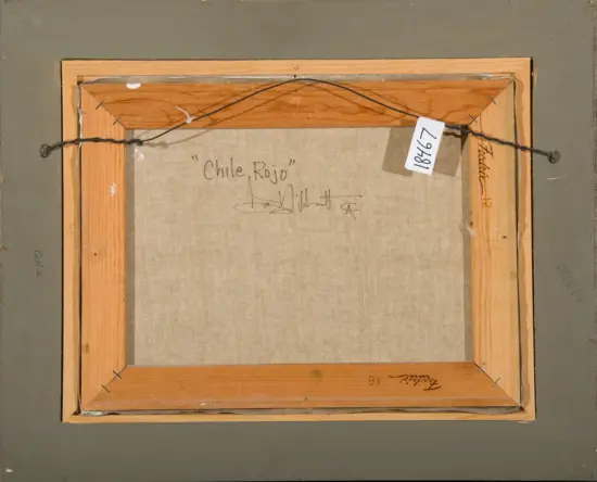Back of a framed canvas showing a wooden stretcher, hanging wire, and a white gallery tag; canvas has handwritten text 'Chile Rojo' on it.