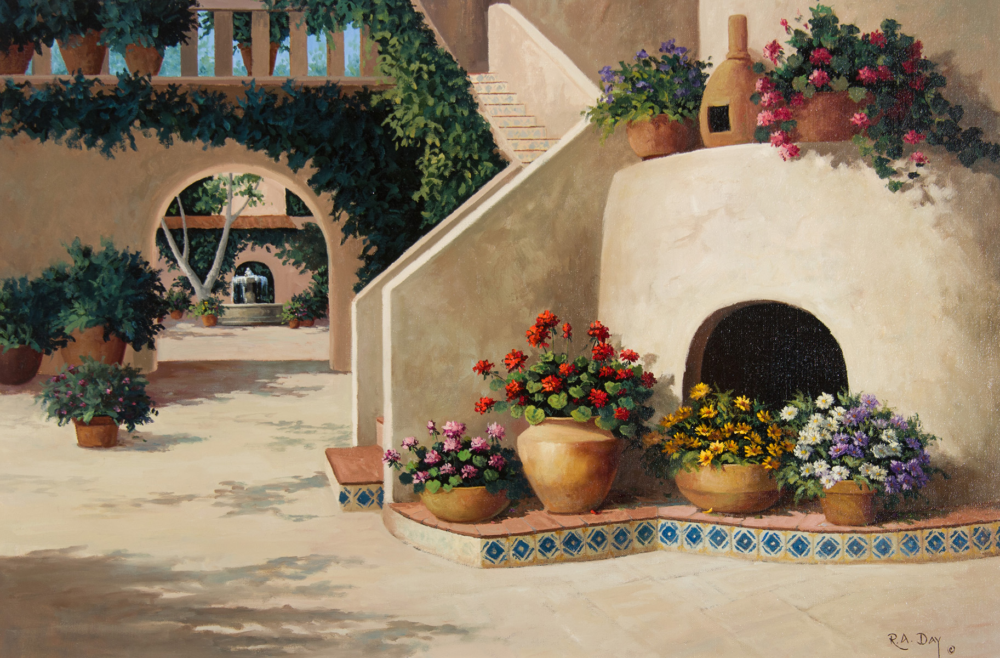 Sunlit Mediterranean courtyard with arched passage, climbing vines, and many potted flowers along a tiled edge.