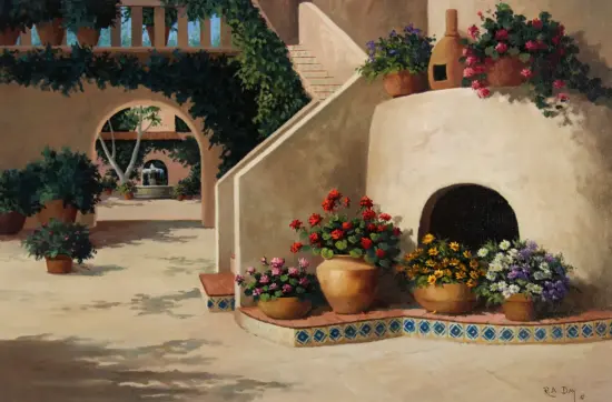 Sunlit Mediterranean courtyard with potted flowers around a white stucco oven and an arched doorway in the background. vines cover arches above.