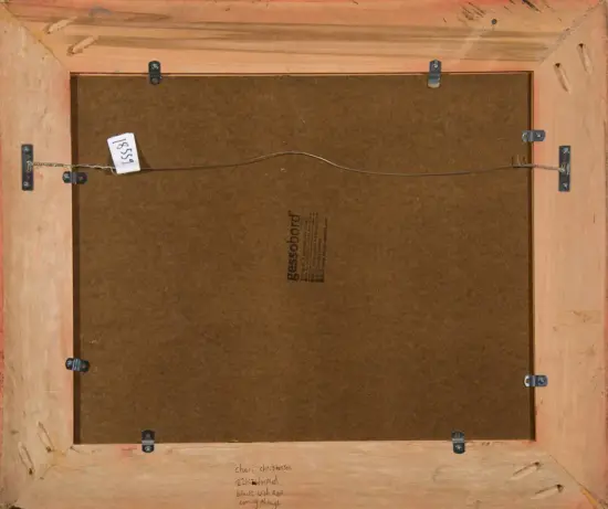 Back of a wooden-framed painting, showing a hanging wire, metal eye hooks, and corkboard backing with handwritten notes along the bottom edge.