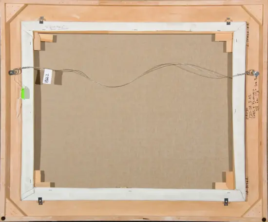 Back of a stretched canvas frame; wooden stretcher bars with a taut hanging wire across the back and metal hardware at the corners.