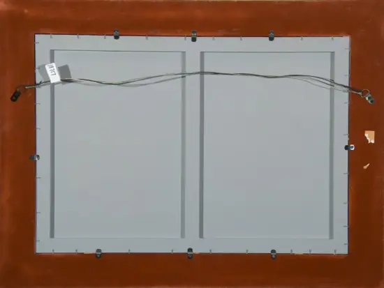 Back of a framed two-panel artwork, with a twisted hanging wire across the top and a small label attached on the left edge.