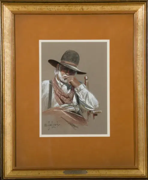 Framed print of a man in a wide-brimmed hat, white shirt, suspenders, and a scarf, resting his chin on his hand in a contemplative pose.