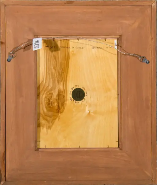 Back of a framed artwork showing a wire hanging system, metal hooks, and a plywood backboard inside a brown wooden frame. A small white tag with numbers is attached to the wire.