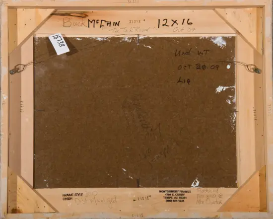Back of a framed painting showing the wooden stretcher frame, hanging wires on both sides, a small tag with number 08738, and several handwritten notes and stampings about frame style, finish, and purchase details.