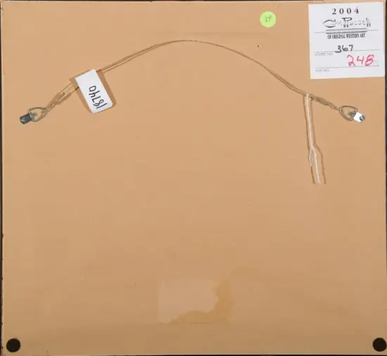 Back of a framed artwork showing a metal hanging wire with end hooks, string tags, and an inventory label in the corner.