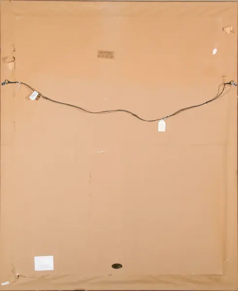 Back of a framed artwork: a metal hanging wire runs across the back between two anchors, with tags and labels attached to the wire and frame.