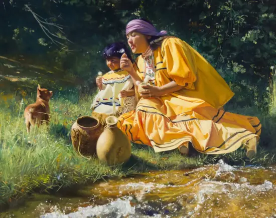 Two people in colorful dresses sit by a stream, with round clay pots nearby and a small brown dog on the grass behind them.